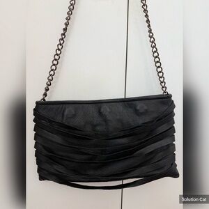 Black layered leather fringe bag with chain strap